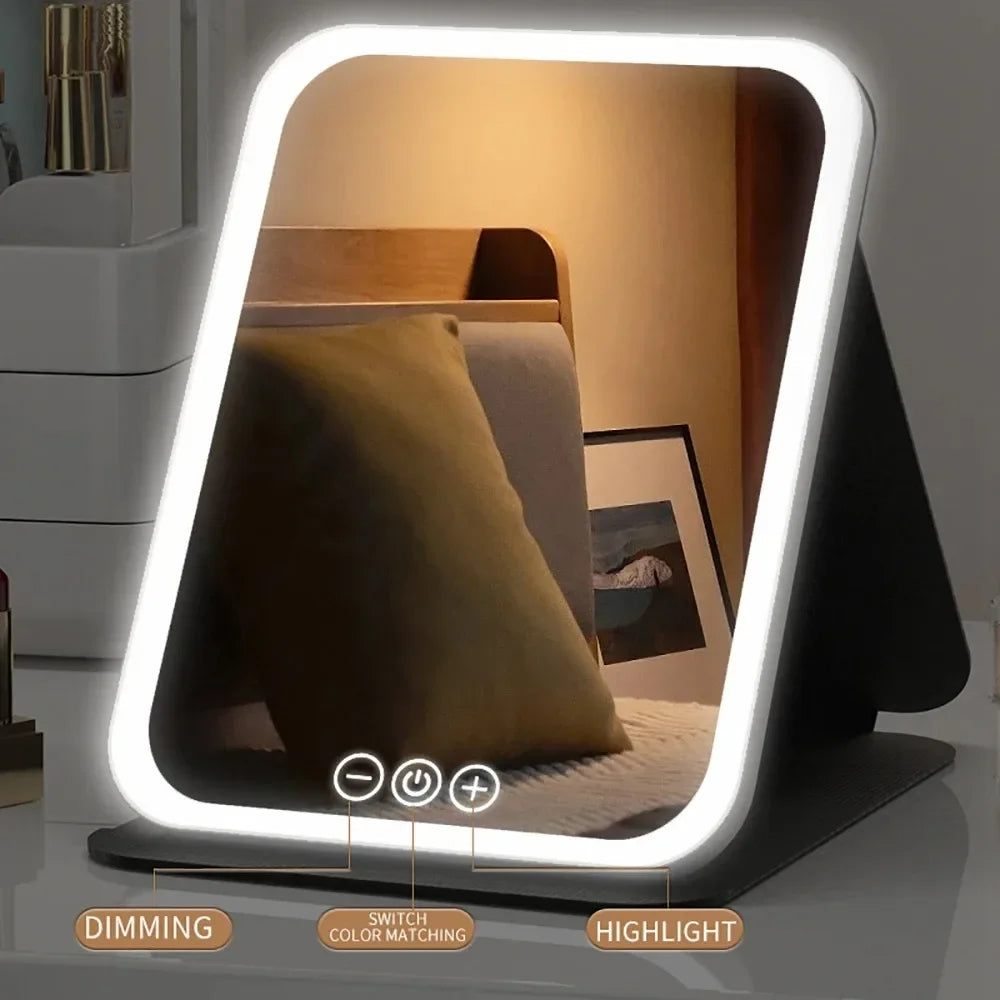 The Spotlight LED travel makeup mirror open with warm light